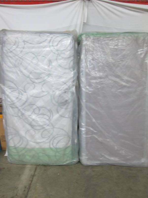 lot 5 image: Sealy Tuberose Firm Mattress and Sealy Box Spring - Twin