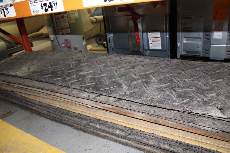 lot 32 image: Lot of (app. 12 ct) Traction Rubber Mats To Prevent Sinking While Driving  Parked Diamond Plate Design 24 x 90.