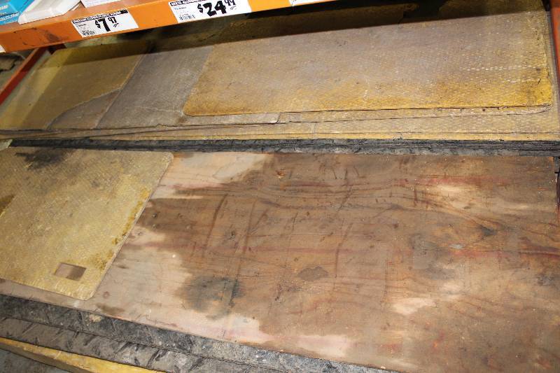 lot 33 image: Lot of (app. 7 ct) Fiberglass Mats For Parking Autombiles On To Prevent Sinking Includes Piece of Plywood Some Mats Are Broken 24 x 99.
