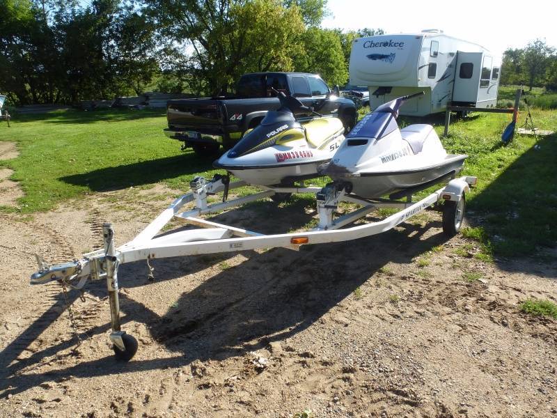 lot 9 image: 1999 Polaris SLX 1050 & Seadoo 580 with trailer package