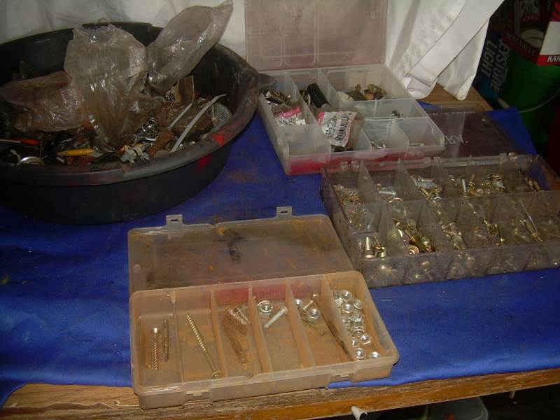misc nuts and screws with oil pan