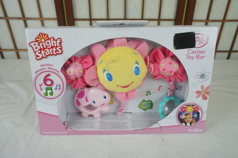 lot 12 image: Bright Starts Pretty in Pink Carrier Toy Bar