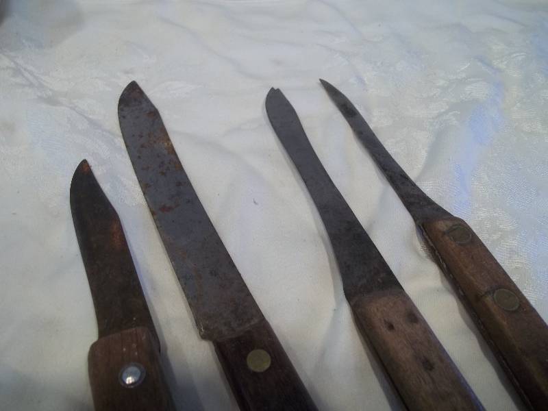 Knife Sharpener with Old Rusty Knives