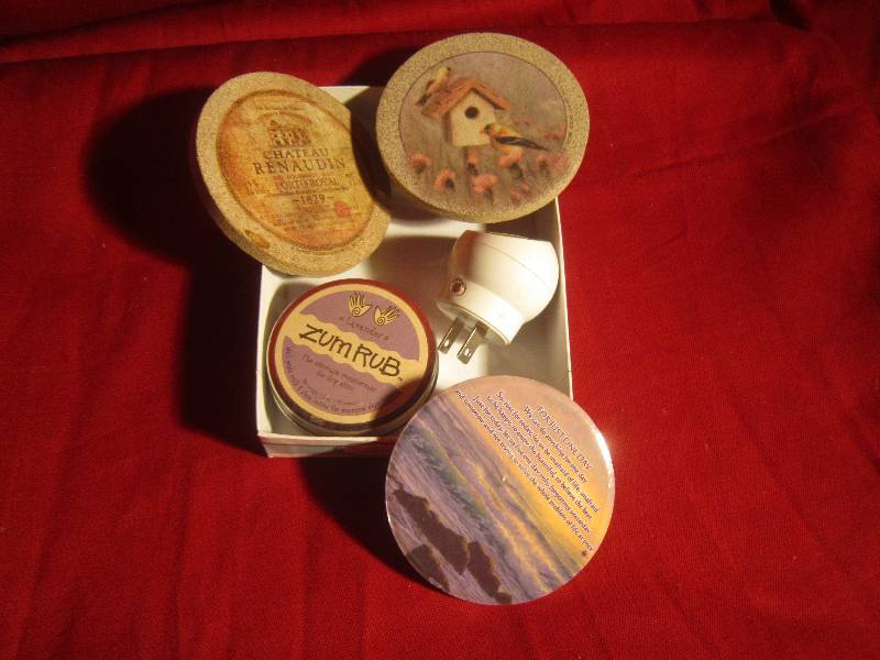 lot 373 image: Misc Lot - Coasters Magnet, Travel Candle & Plug in Light