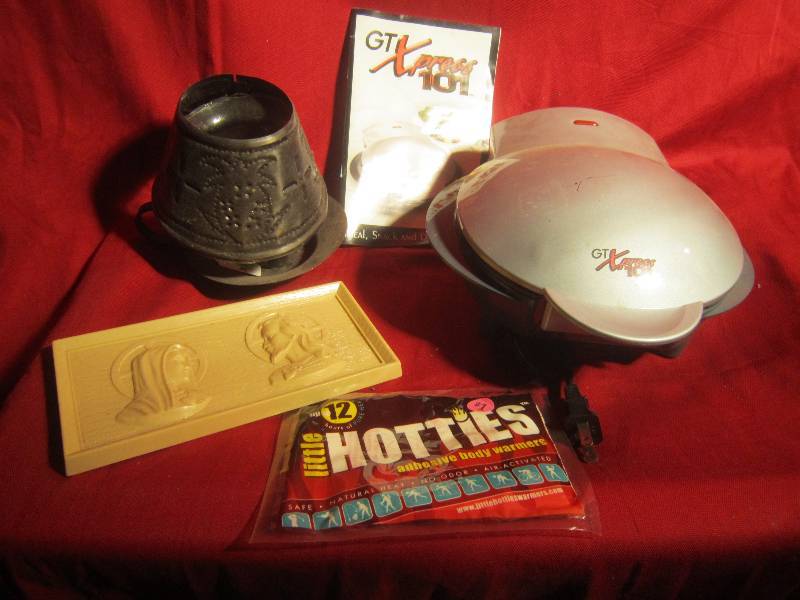 lot 385 image: Misc Lot - 3 Citranoella Candles, Hotties, Religious Picture, Ice Cube Tray, Sandwich Express, ETC