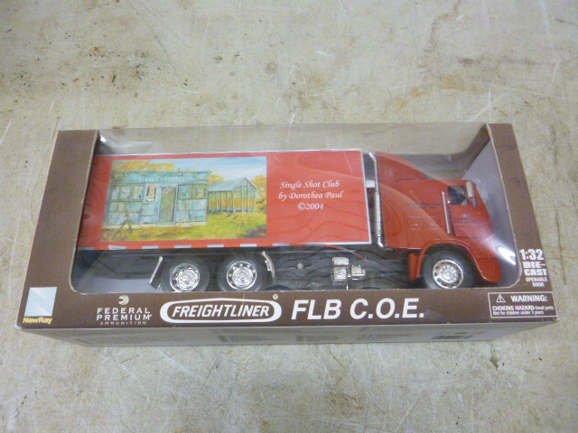 lot 13 image: Freightliner New Ray Single Shot Gun Die Cast Truck