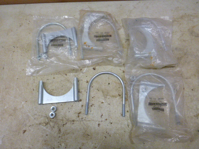 lot 21 image: 5 Muffler Clamps
