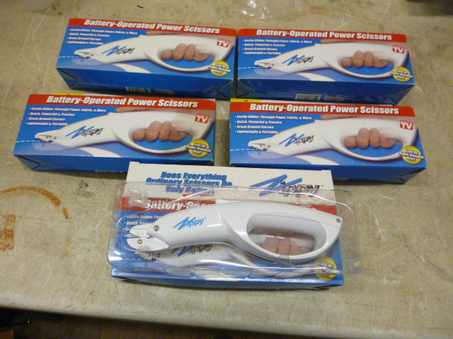 lot 81 image: 5 Zippy Battery Operated Power Scissors