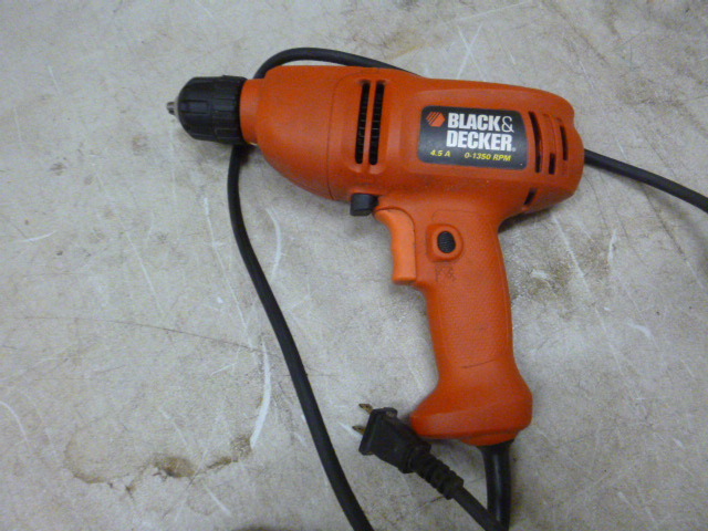 lot 124 image: Black & Decker Variable Speed 38 Drill