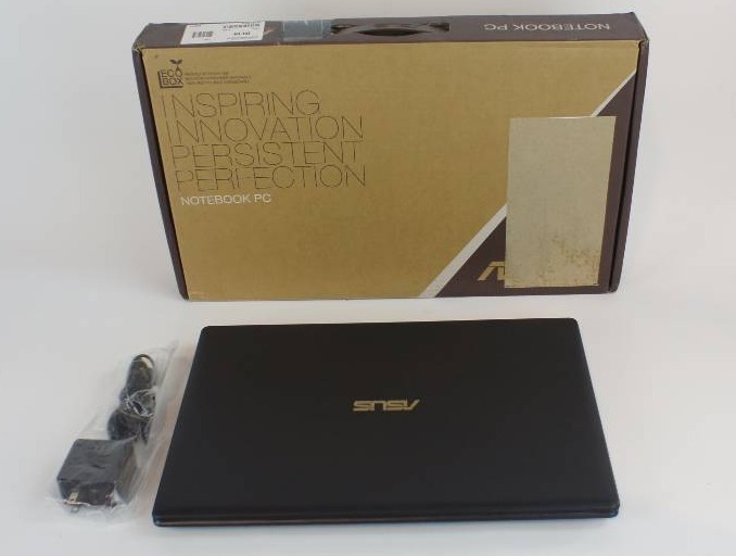 lot 1 image: ASUS 15.6 4GB Windows 8.1 Laptop