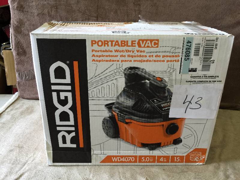 lot 43 image: Ridgid 4 Gal Portable WetVac WD4070