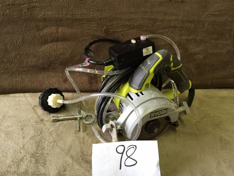 lot 98 image: Ryobi 4 Hand Held Tile Saw