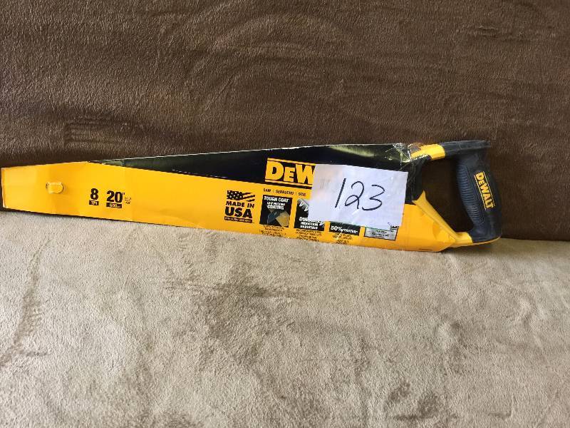 lot 123 image: Dewalt Saw
