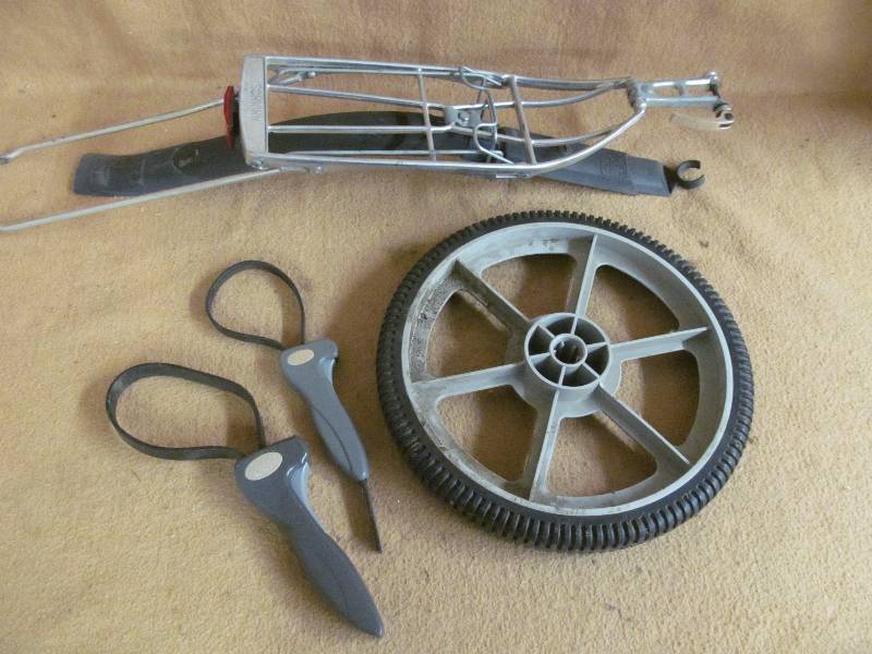 bike rack, Mower tire, wrenches