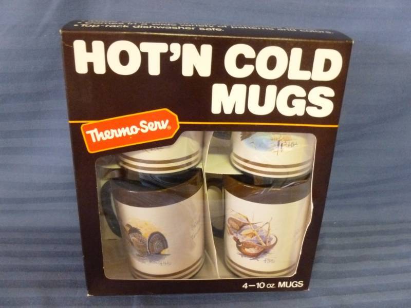 lot 143 image: Vintage Les Kouba Mugs