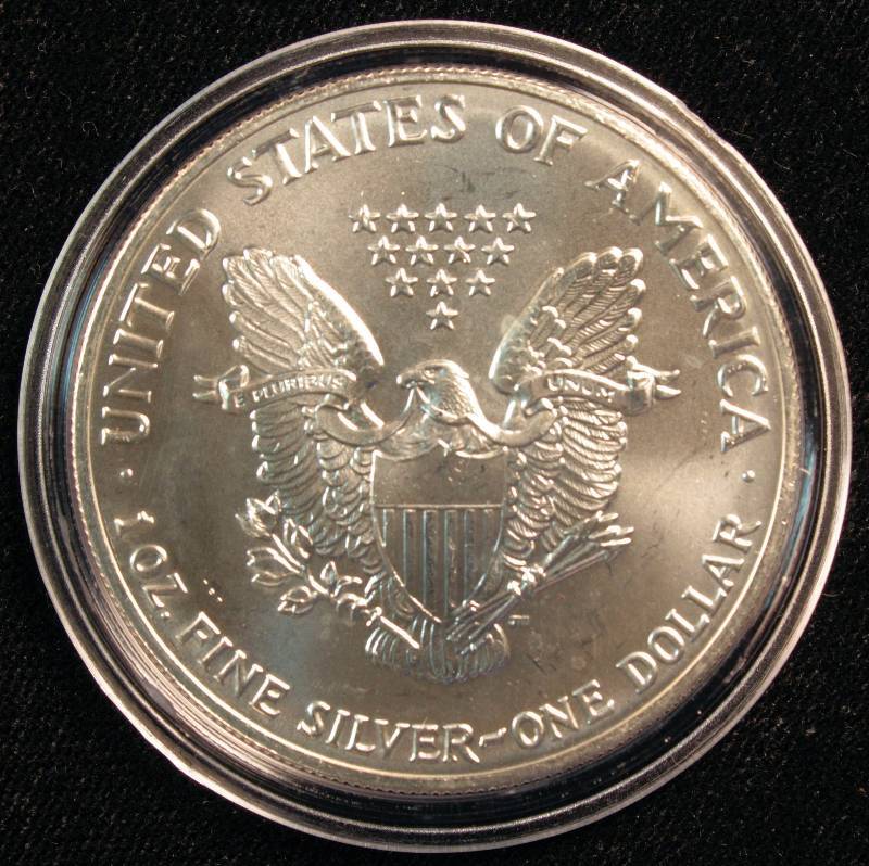 1991 AMERICAN SILVER EAGLE 1 TROY OZ. .999 FINE SILVER DOLLAR IN AIRTIGHT CAPSULE