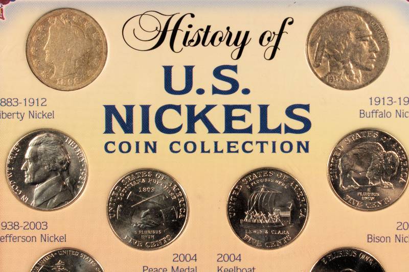 GROUP OF 8 US NICKELS AS PICTURED IN PLASTIC DISPLAY