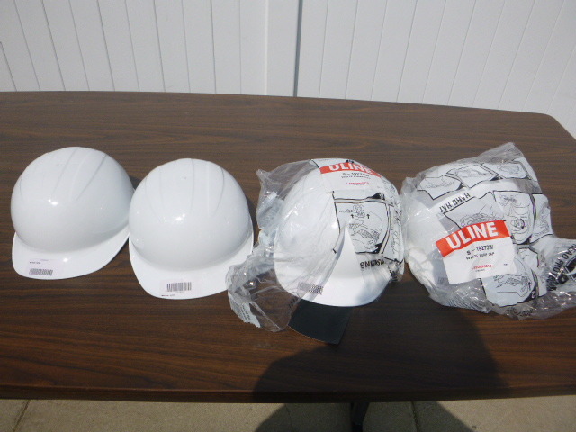 lot 31 image: 4 Uline Hard Hats