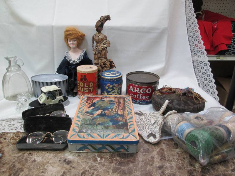 Golf car with a clock, dolls, old t...