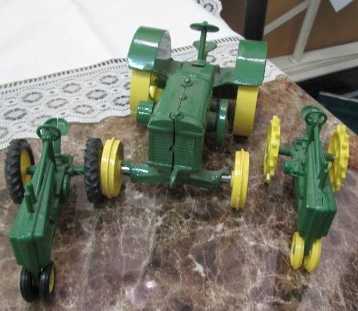 Two smaller john Deere tractor  and...