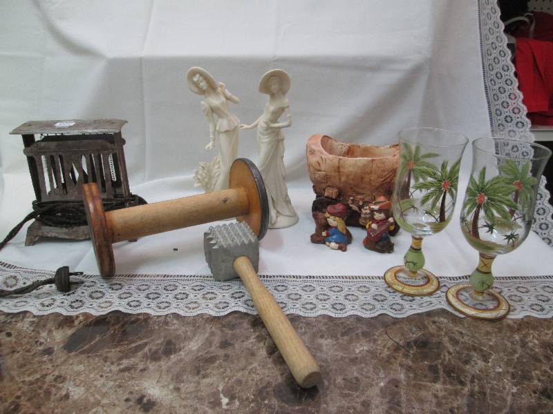 Two ceramic ladies, a wagon, two ni...