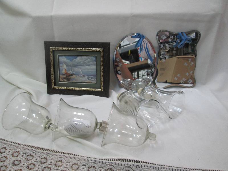 Picture, mirrors, and glass votive...