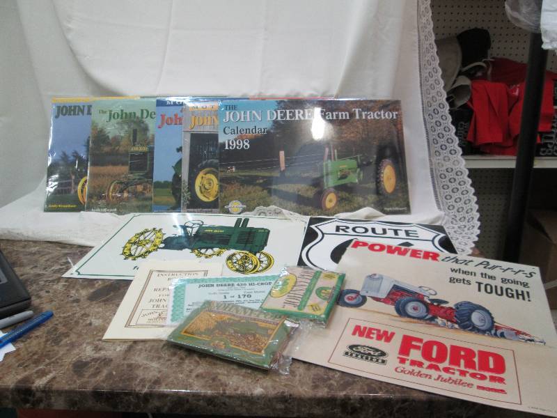 John Deere calendars, route 66 sign...