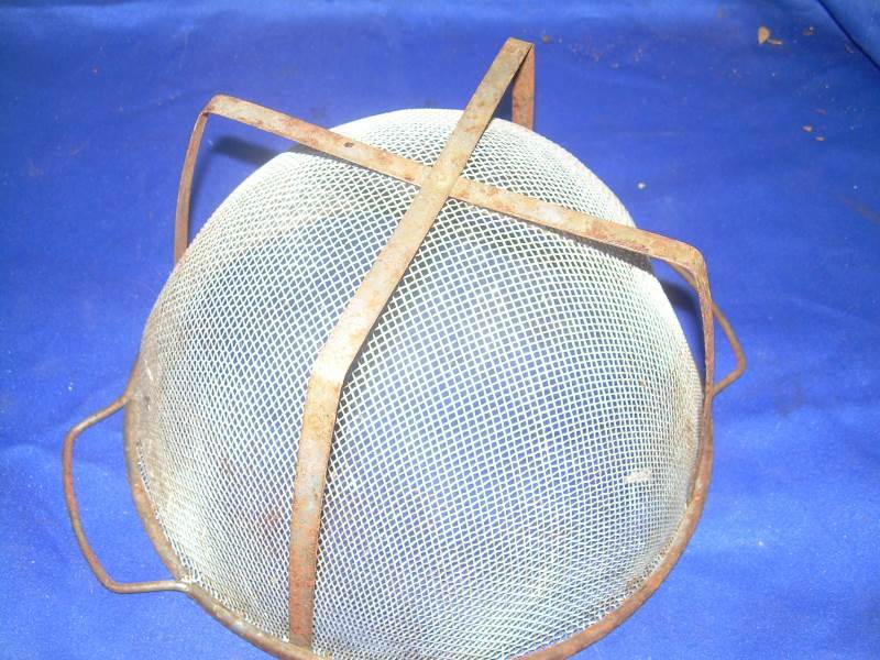 vintage metal strainer