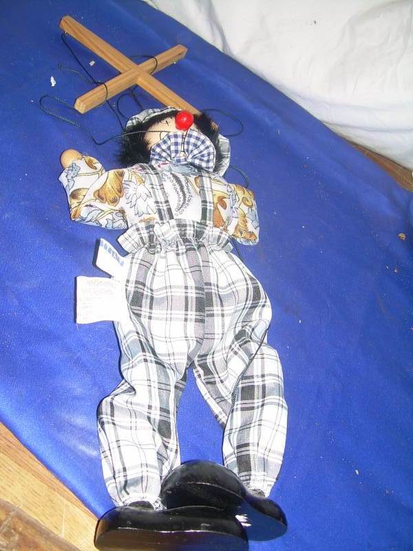 hanging stringed clown puppet
