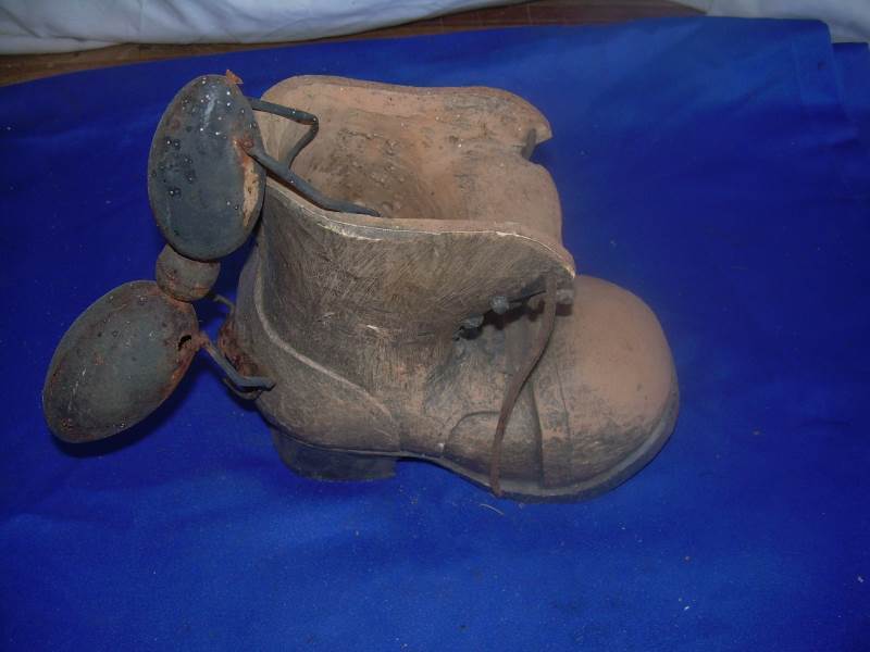Vintage shoe and bag garden ornament