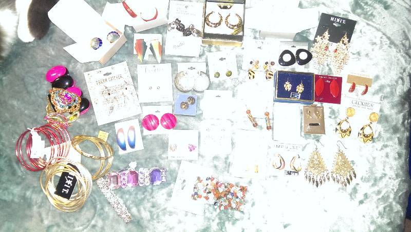 Variety of earrings and bracelets (some gold)