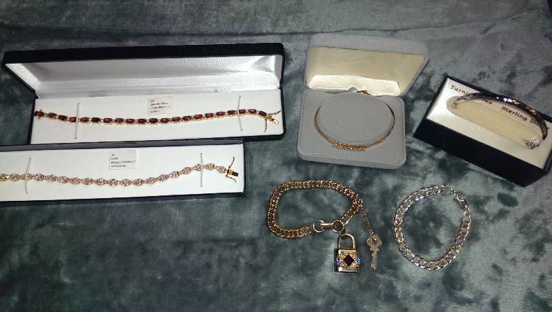 Six bracelets (some 14k gold and silver).
