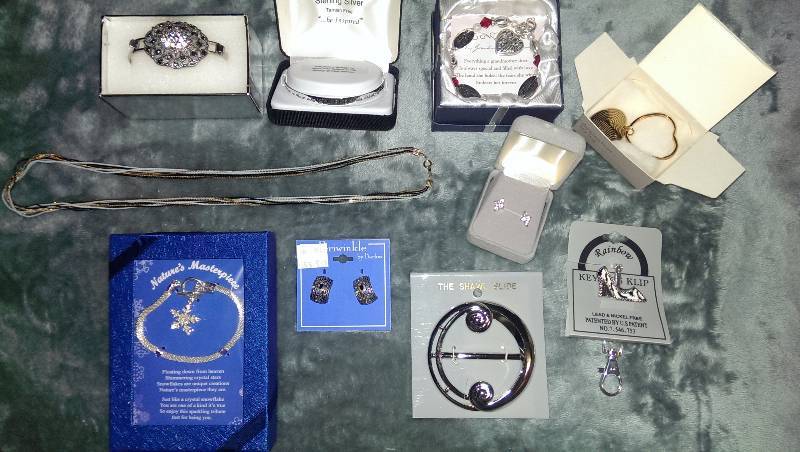 Earrings, bracelets, necklace, keychains, and a scarf holder.