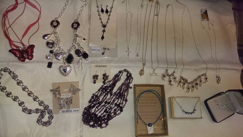 Large variety of necklaces (some sterling silver), and earrings.