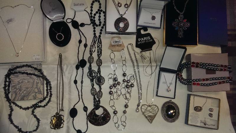 Large variety of necklaces (some sterling silver), and earrings.