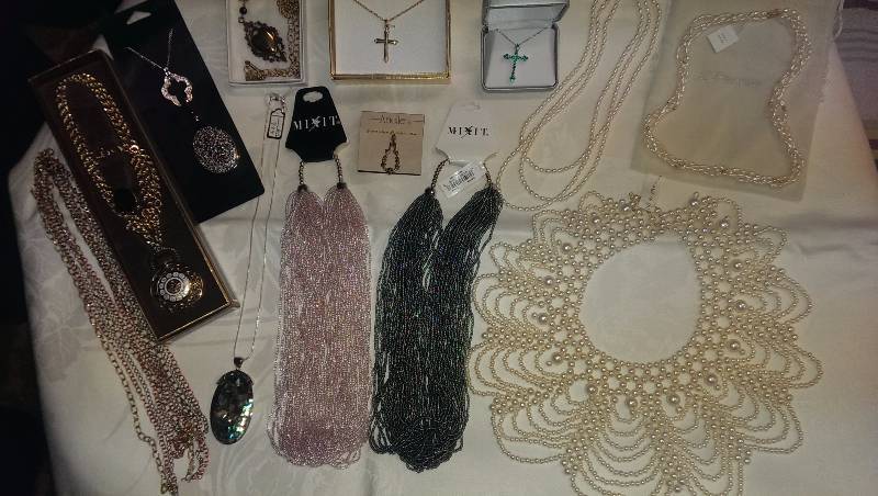 Large variety of necklaces (including some genuine pearl ones).