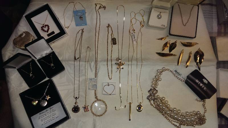 Large variety of necklaces some (18k gold and sterling silver) and pendants.