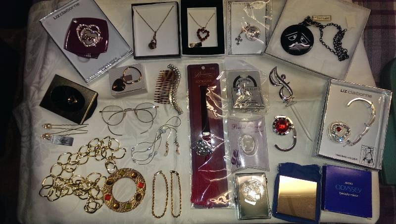 Large variety of necklaces, bag holders, mirrors, hair pins, bookmark, eyeglass holders and earrings.