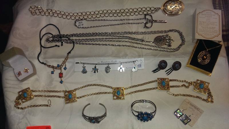 Variety of necklaces, bracelets, earrings, and a belt (some with turquoise accents).