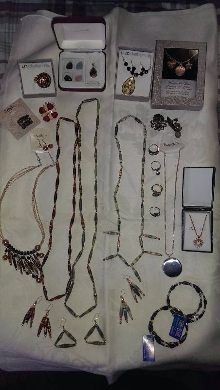Variety of necklaces(some sterling silver), bracelets, earrings, and several rings (some sterling silver).