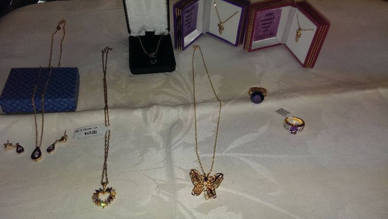 Variety of necklaces, earrings, and ring sets. (Some gold).