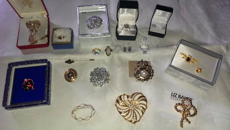 Variety of rings, earrings, and pins (some sterling silver as well as pearl accents).