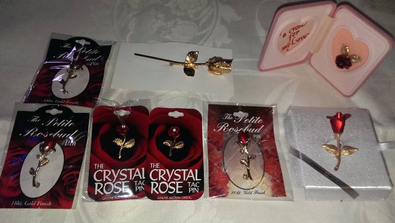 Variety of rose pins.