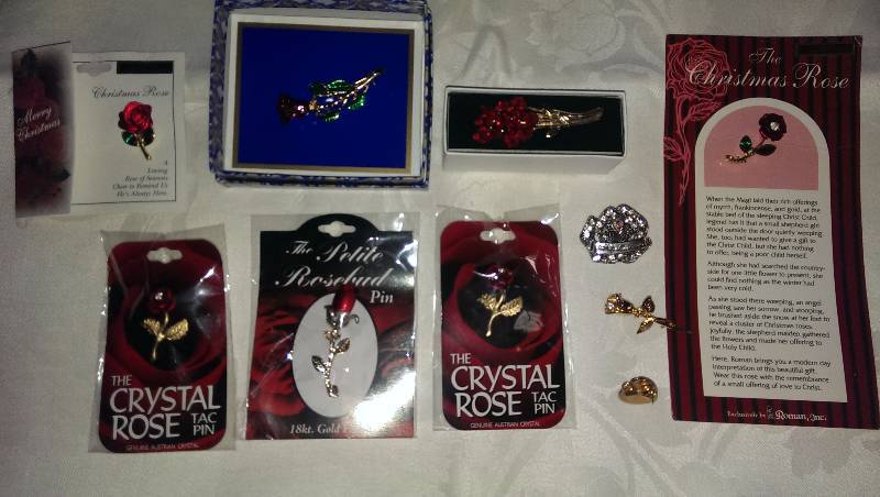 Variety of rose pins.