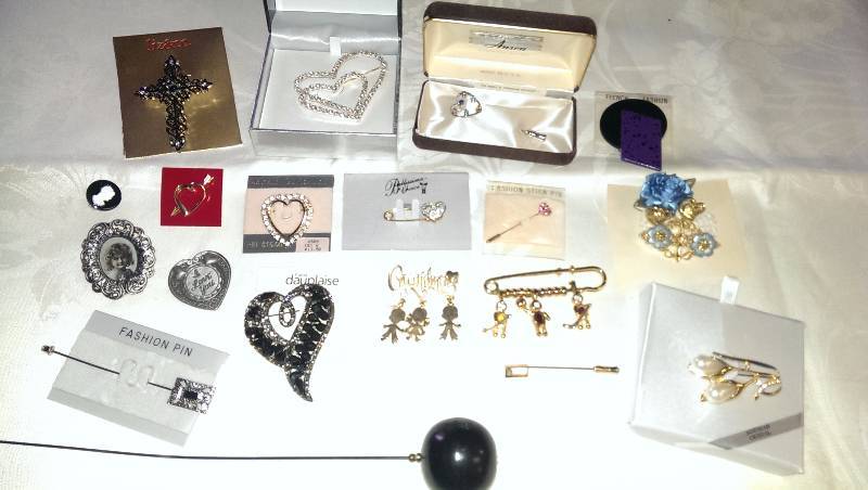 Large variety of deco pins and a hat pin