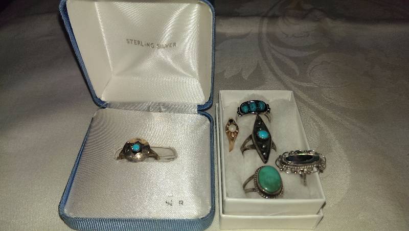 Six rings (gold, sterling silver with turquoise accents)