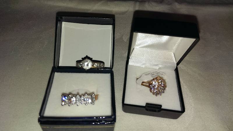 Three rings with gold and cubic zirconia accents