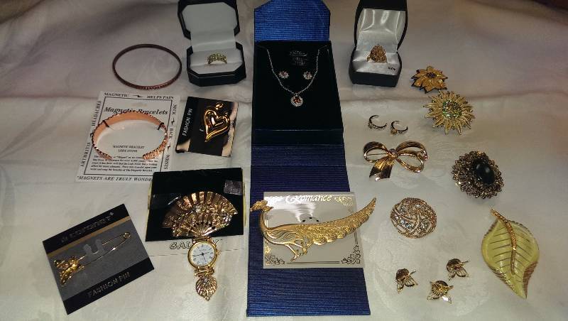 Variety of necklaces, earrings, and ring sets. (Some sterling silver).