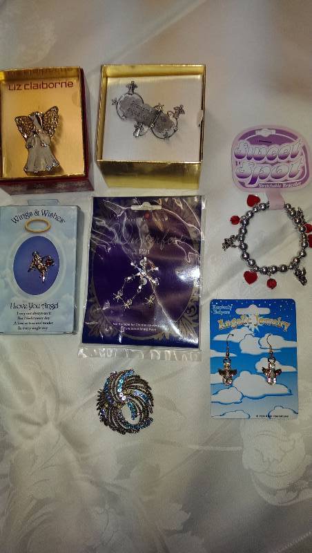Variety of angel and decorative jewelry