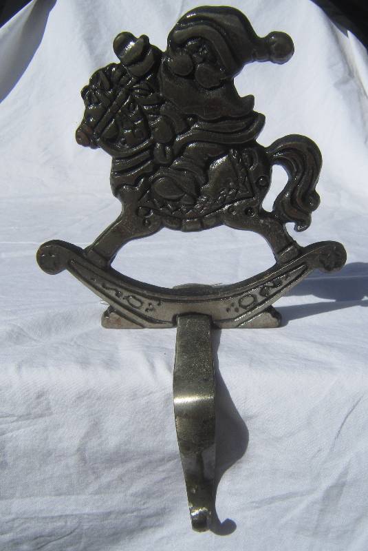 lot 513 image: Heavy Metal Stocking Holder - Santa